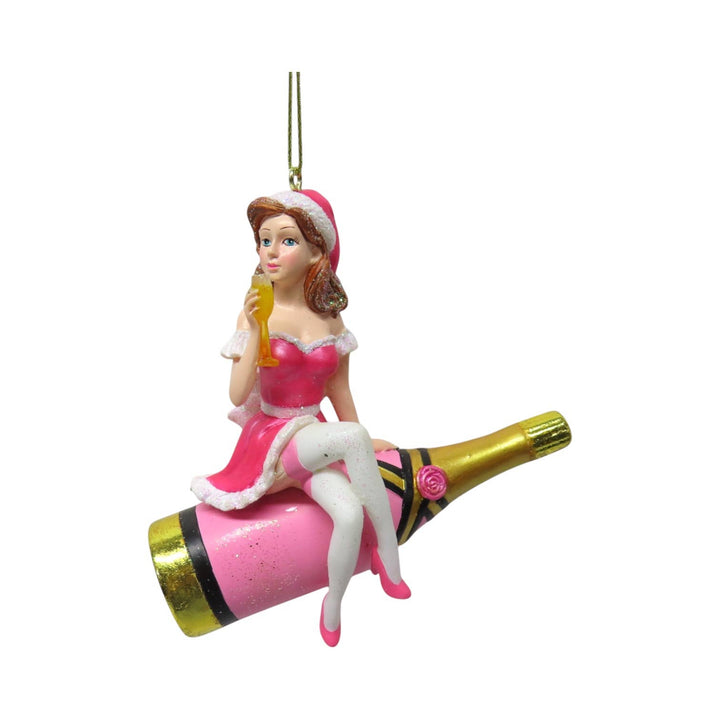 Girl Sitting on Pink Champaigne Orn