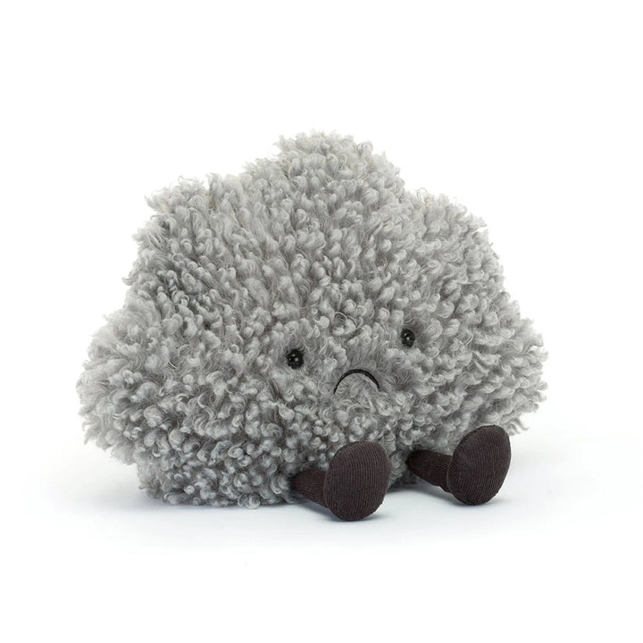 Plush toy hedgehog with wheels on a white background