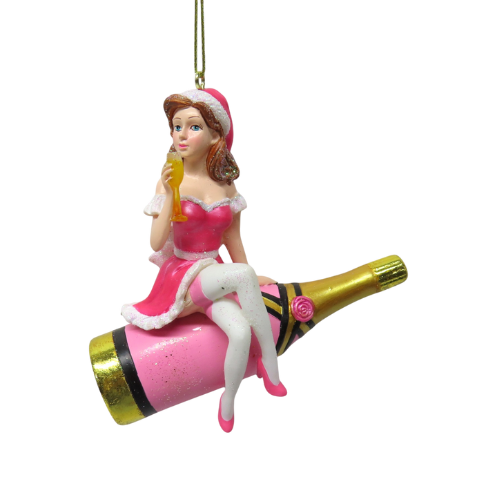Girl Sitting on Pink Champaigne Orn